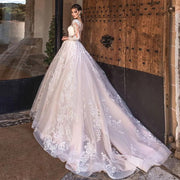 Gorgeous Long Sleeve Ball Gown Wedding Dress with Illusion Back