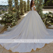 Lceland Poppy A Line Boat Neck Wedding Dresses 2023 Floor Length Beaded Lace Appliques Bridal Gowns with Cathedral Train